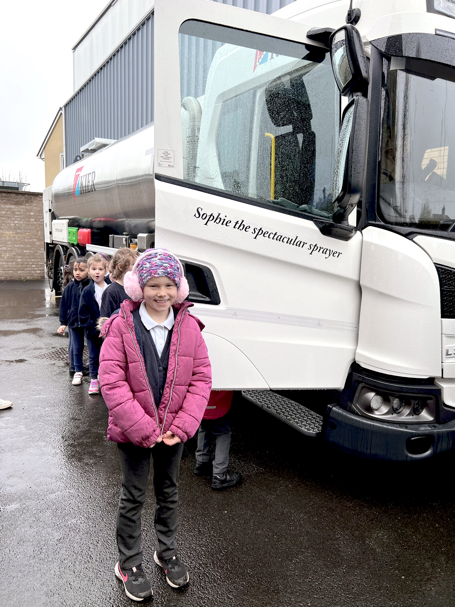 Pupil, Ember standing proudly next to Sophie the Spectacular Sprayer Sophie the Spectacular Sprayer’ paves the way for Bristol surface treatment works
