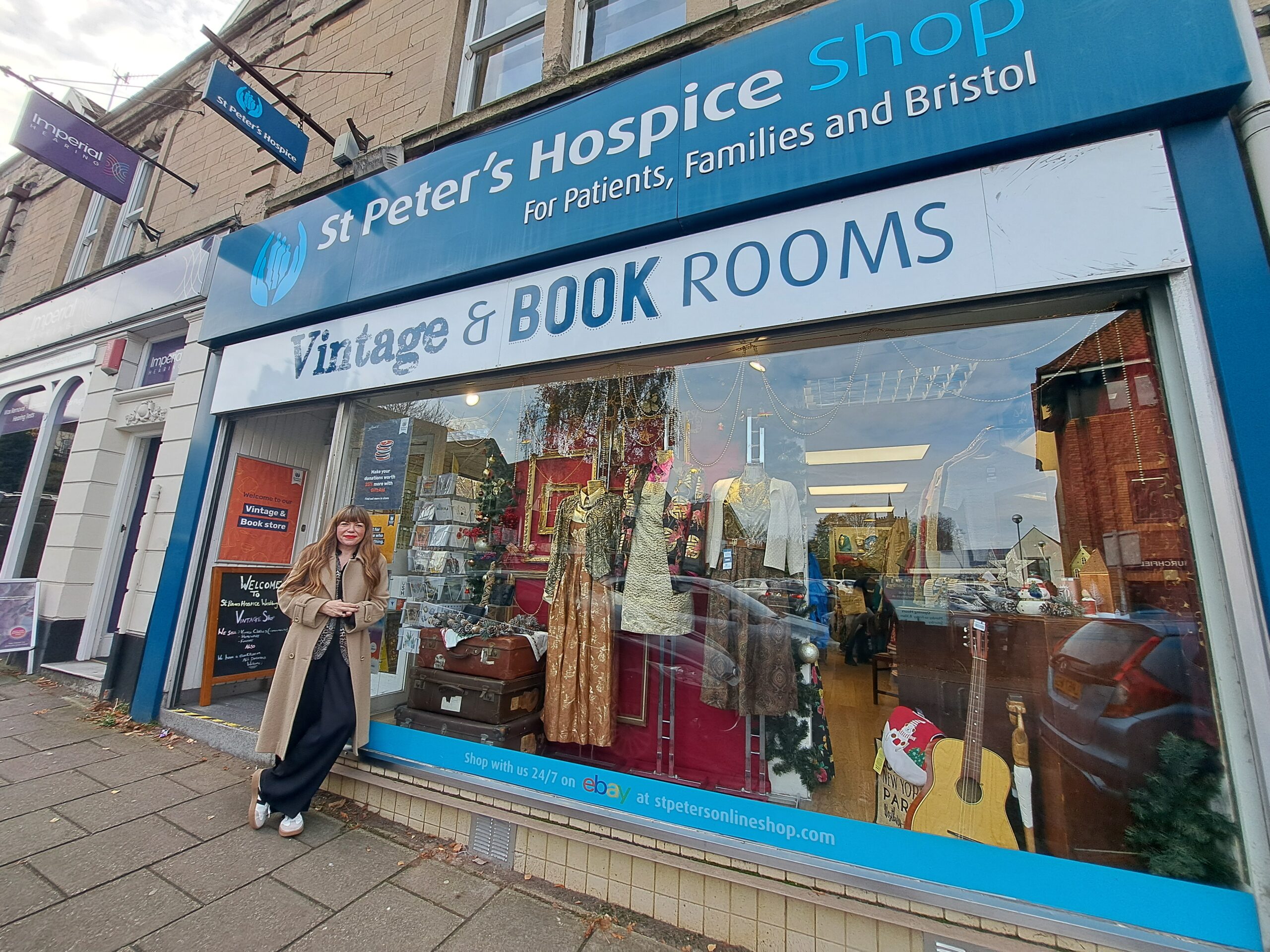Briony May Williams helps relaunch St Peter’s Hospice shop in Bristol ahead of Christmas shopping season